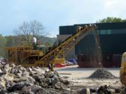 Crushing removed concrete to use as working surface